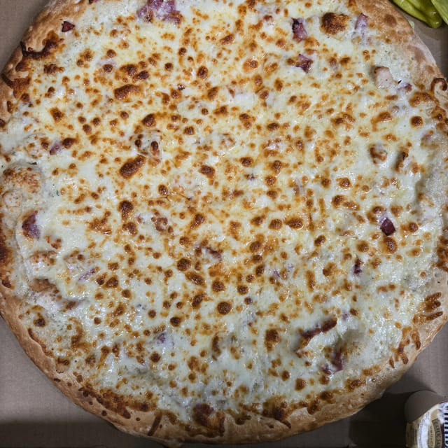 Turkey Bacon Chicken Ranch Pizza.